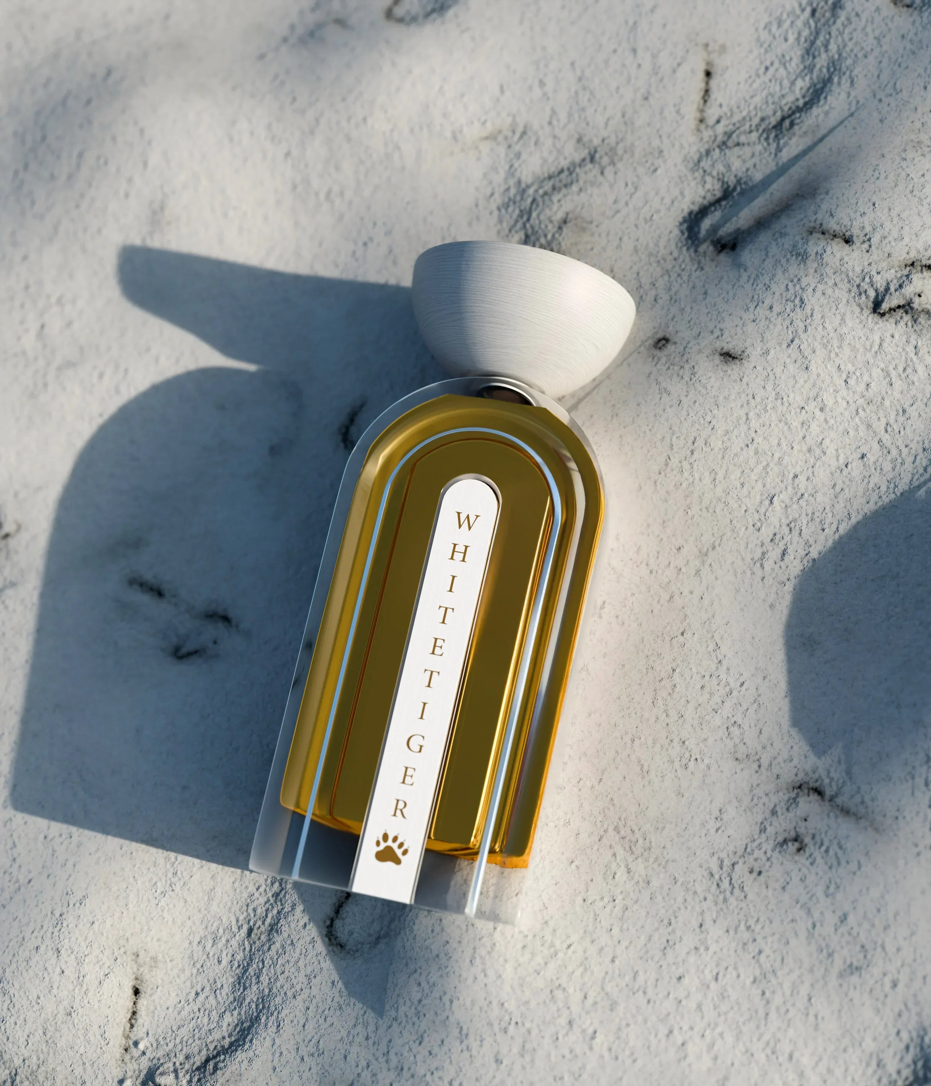 Elegant White Tiger perfume bottle with gold accents on snowy surface