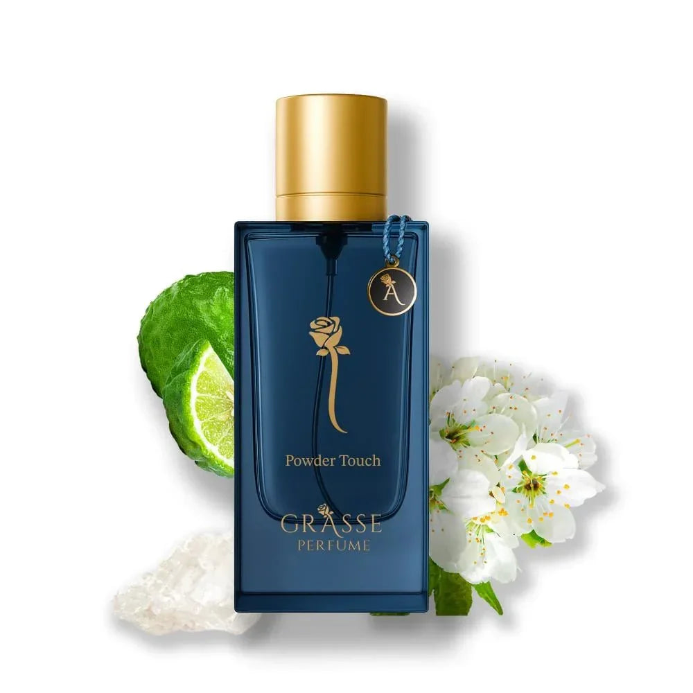 Blue Grasse Perfume Powder Touch bottle with gold cap, lime, white blossoms and crystals