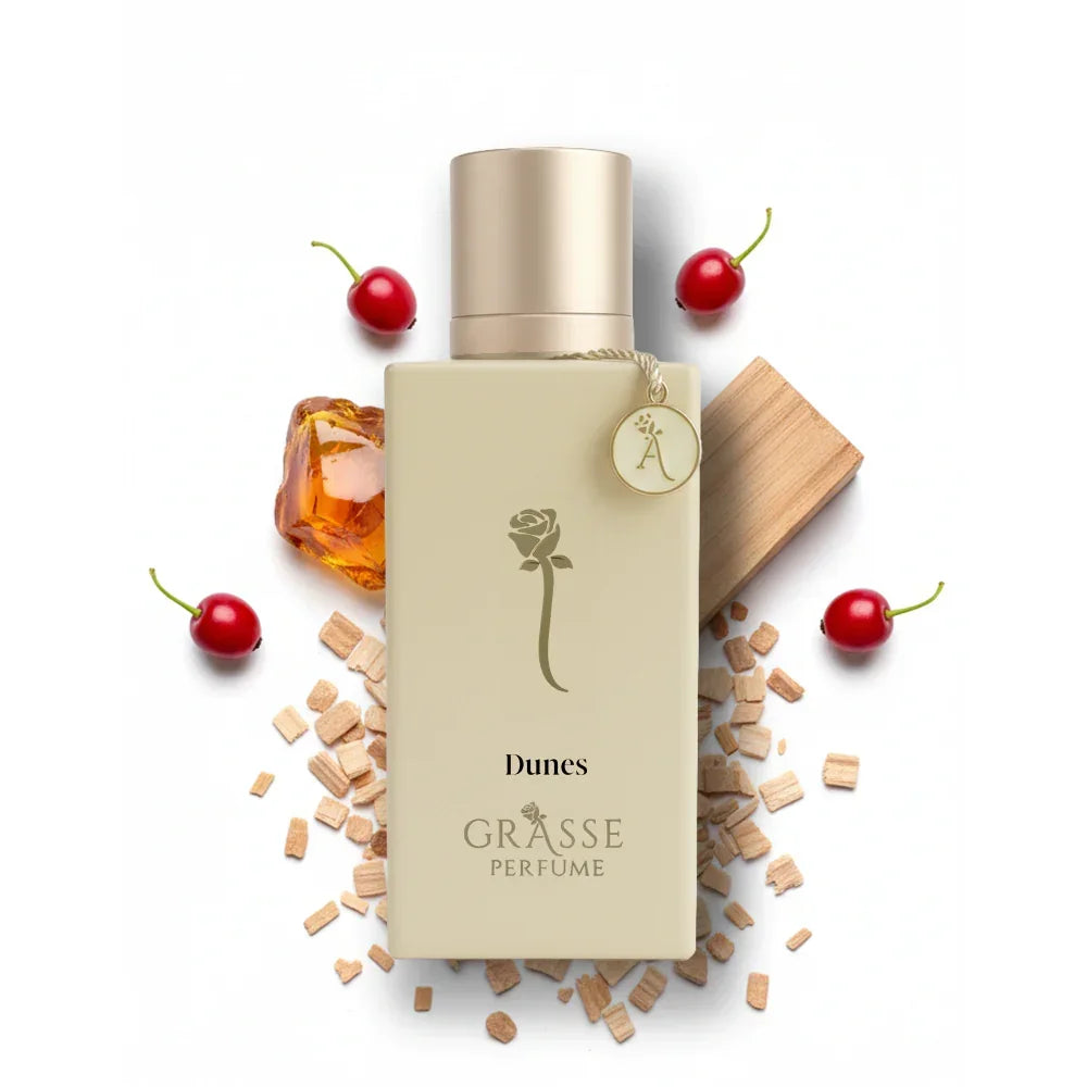 Luxury Grasse Dunes perfume bottle with wood chips, cherries, and amber accents