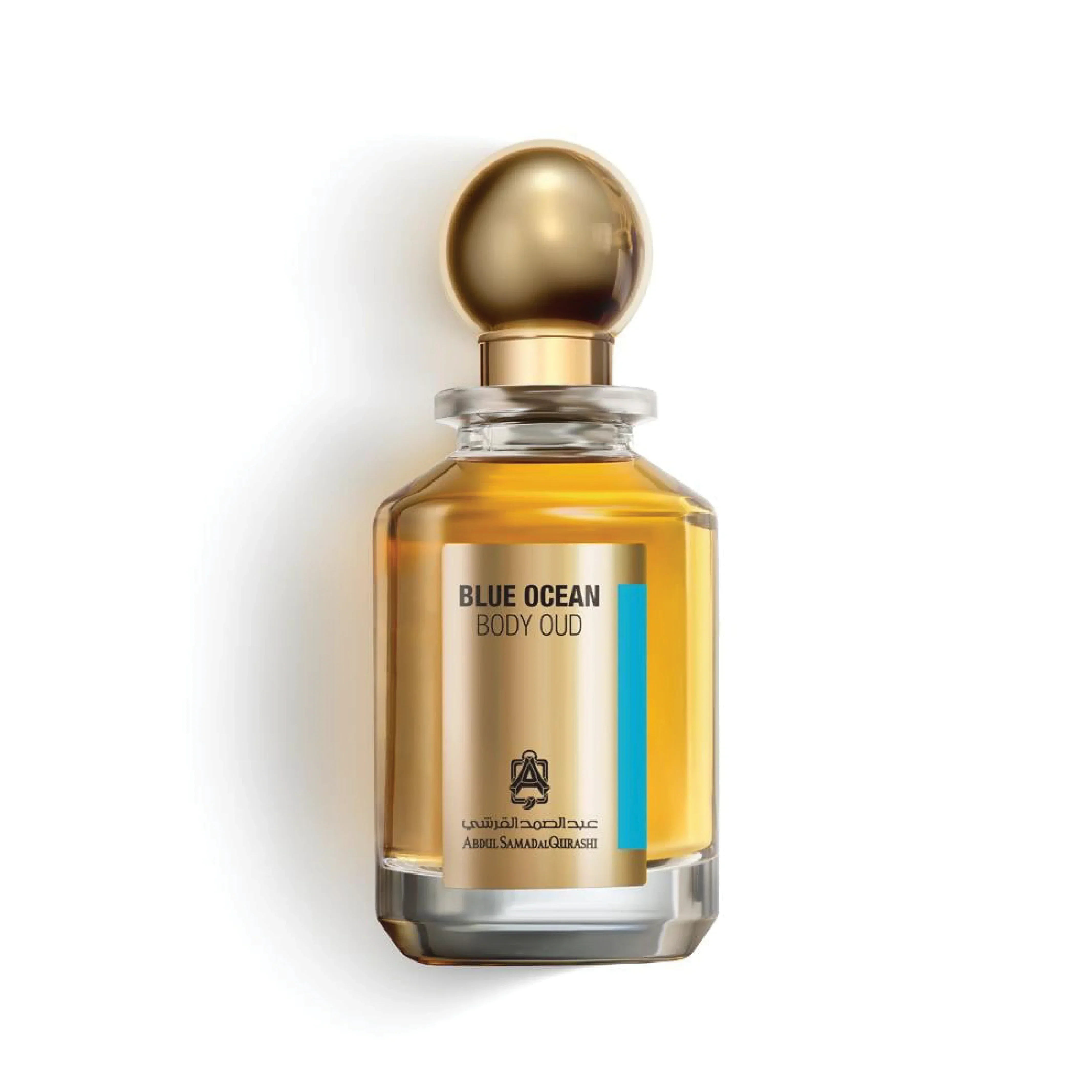 Blue Ocean Body Oud luxury perfume bottle with gold cap and clear amber liquid on white background.