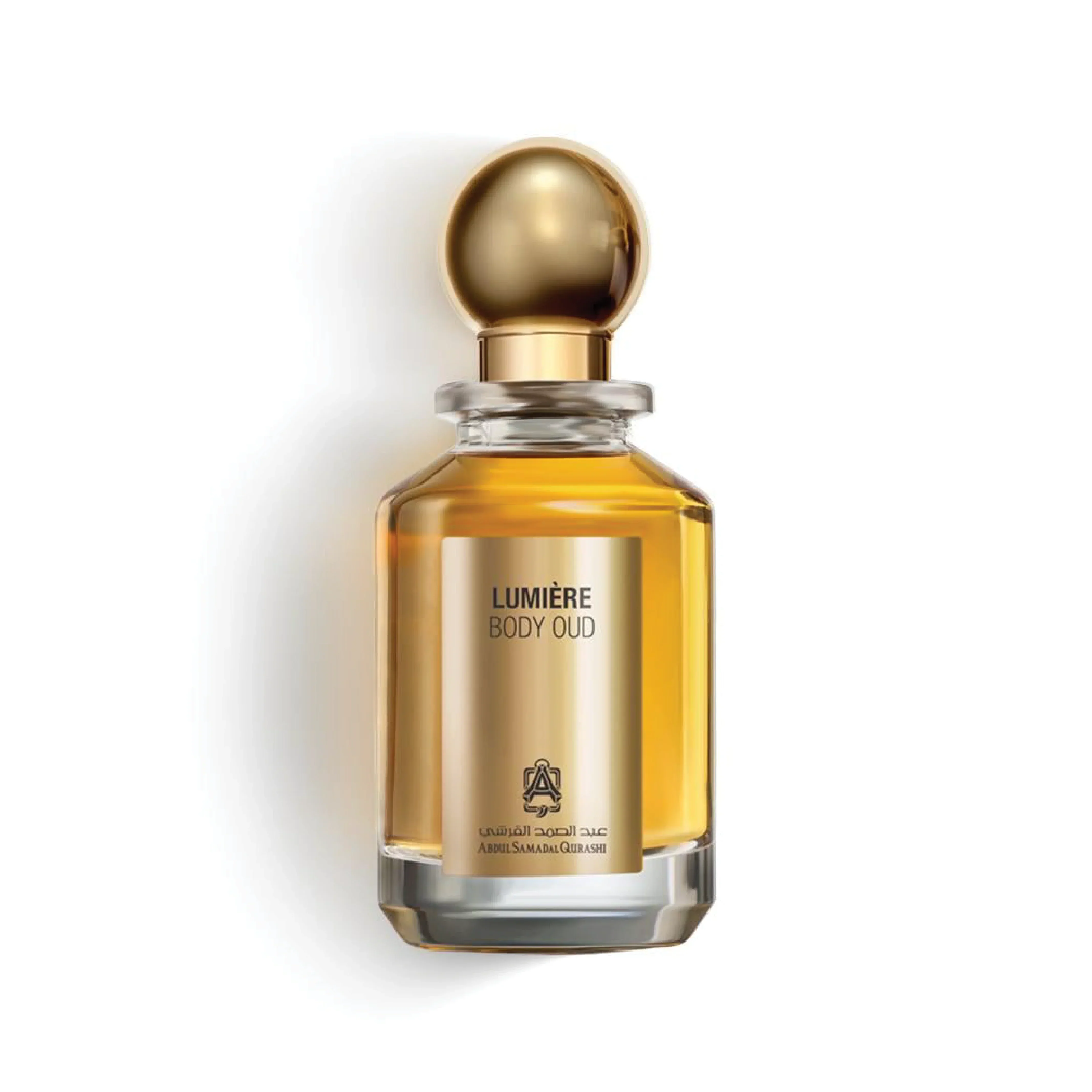 Lumière Body Oud perfume bottle with gold cap and label on white background.
