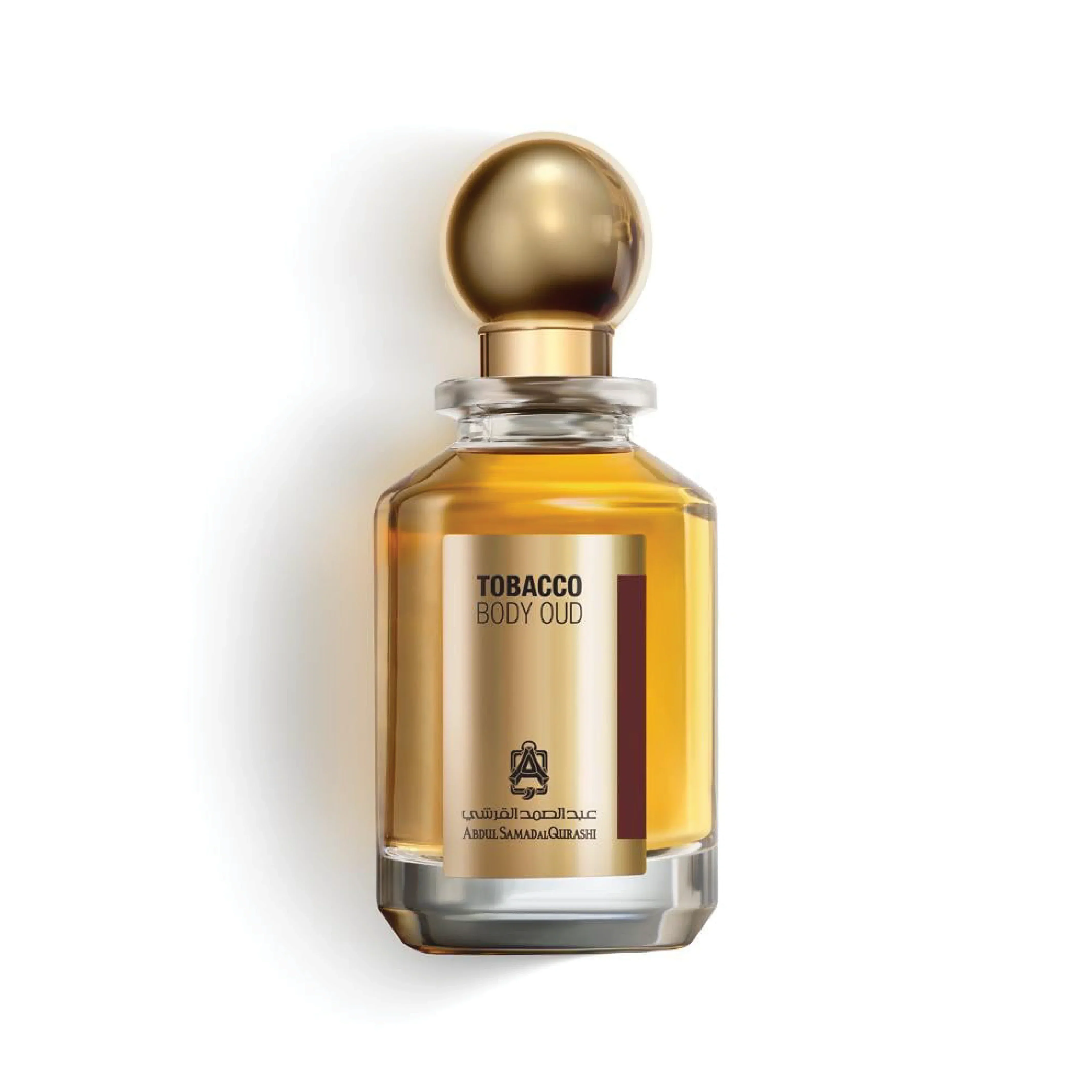 Tobacco Body Oud perfume bottle with gold cap on white background