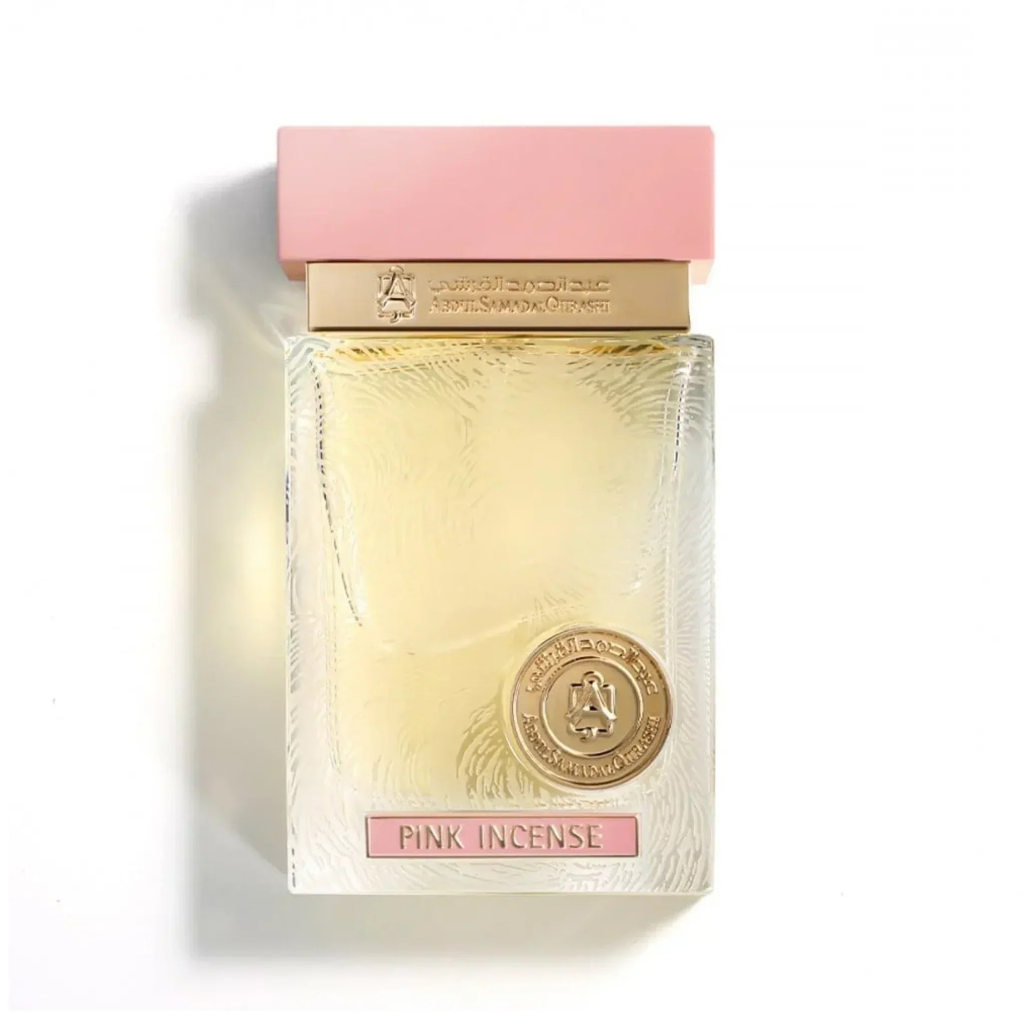 Elegant Pink Incense perfume bottle with gold accents and a pink cap on white background