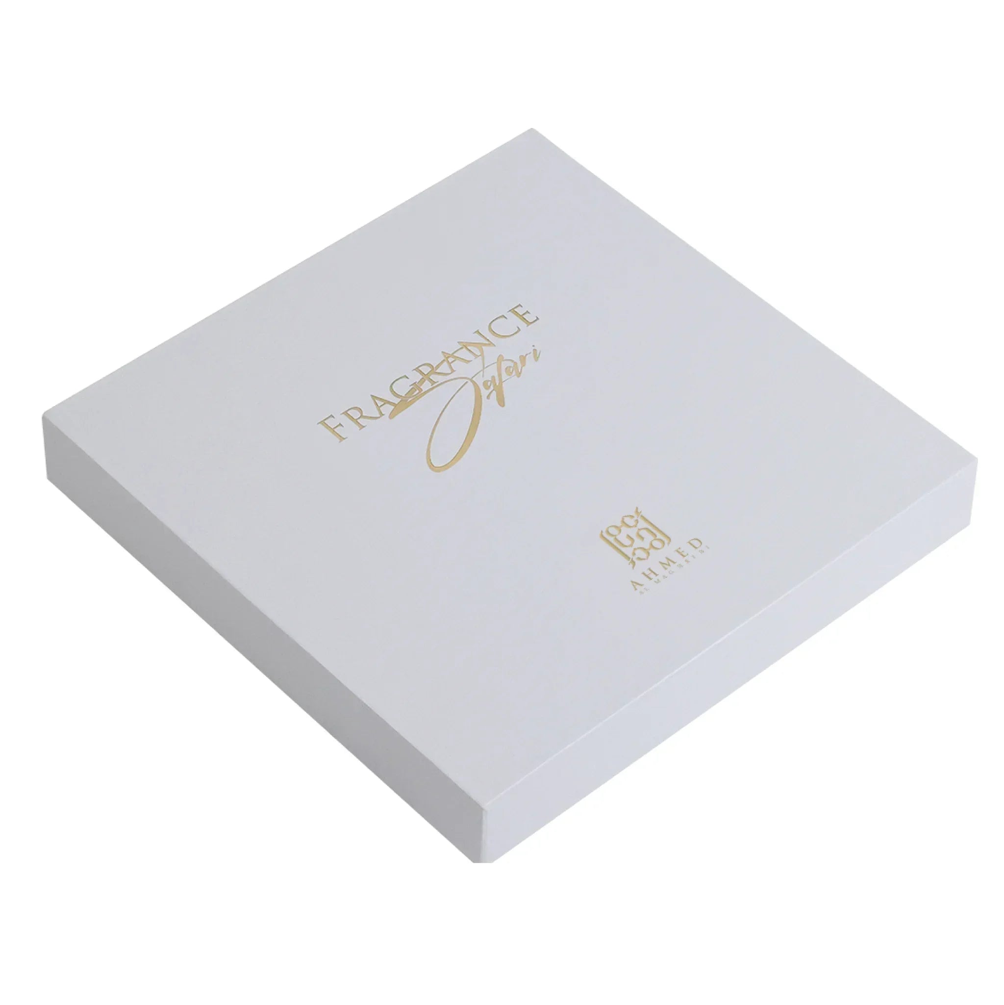 Elegant white luxury fragrance gift box with gold lettering on the lid.