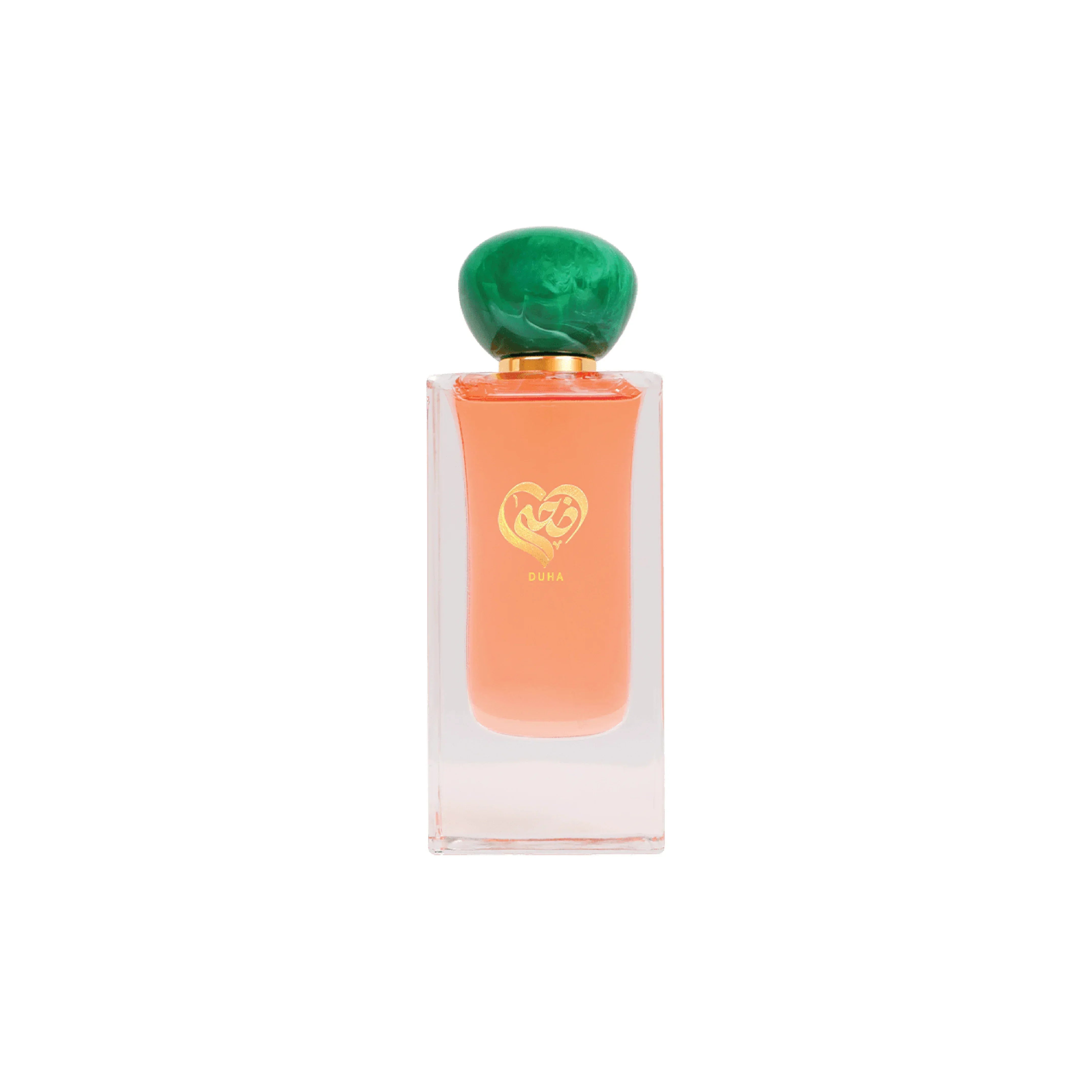 Luxury perfume bottle with green cap and gold heart logo, featuring peach-colored fragrance