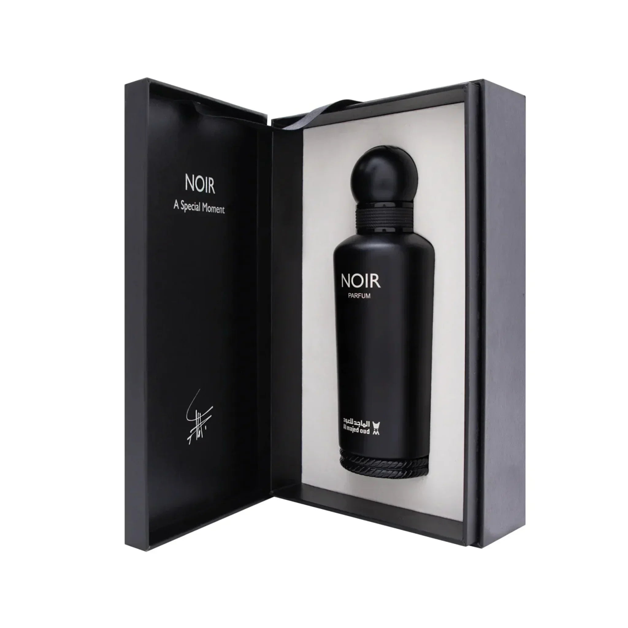 NOIR luxury perfume bottle in a sleek black gift box, elegant Middle Eastern fragrance