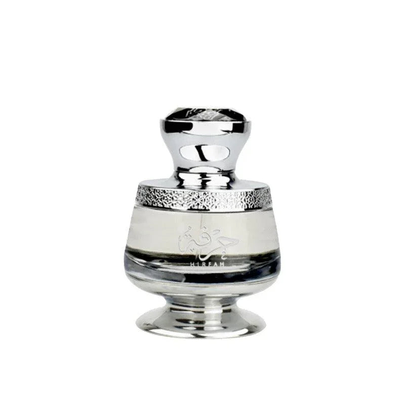 Luxury Middle Eastern perfume bottle with intricate silver detailing and elegant design