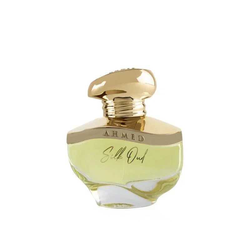 Elegant Ahmed Silk Out perfume bottle with gold cap and pale yellow fragrance