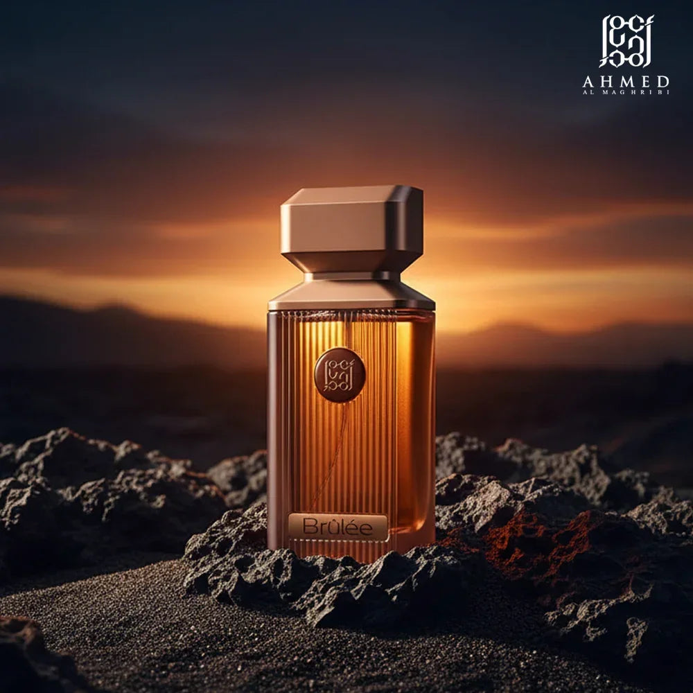 Luxury amber Brûlée perfume bottle on volcanic rocks at sunset with Middle Eastern design.