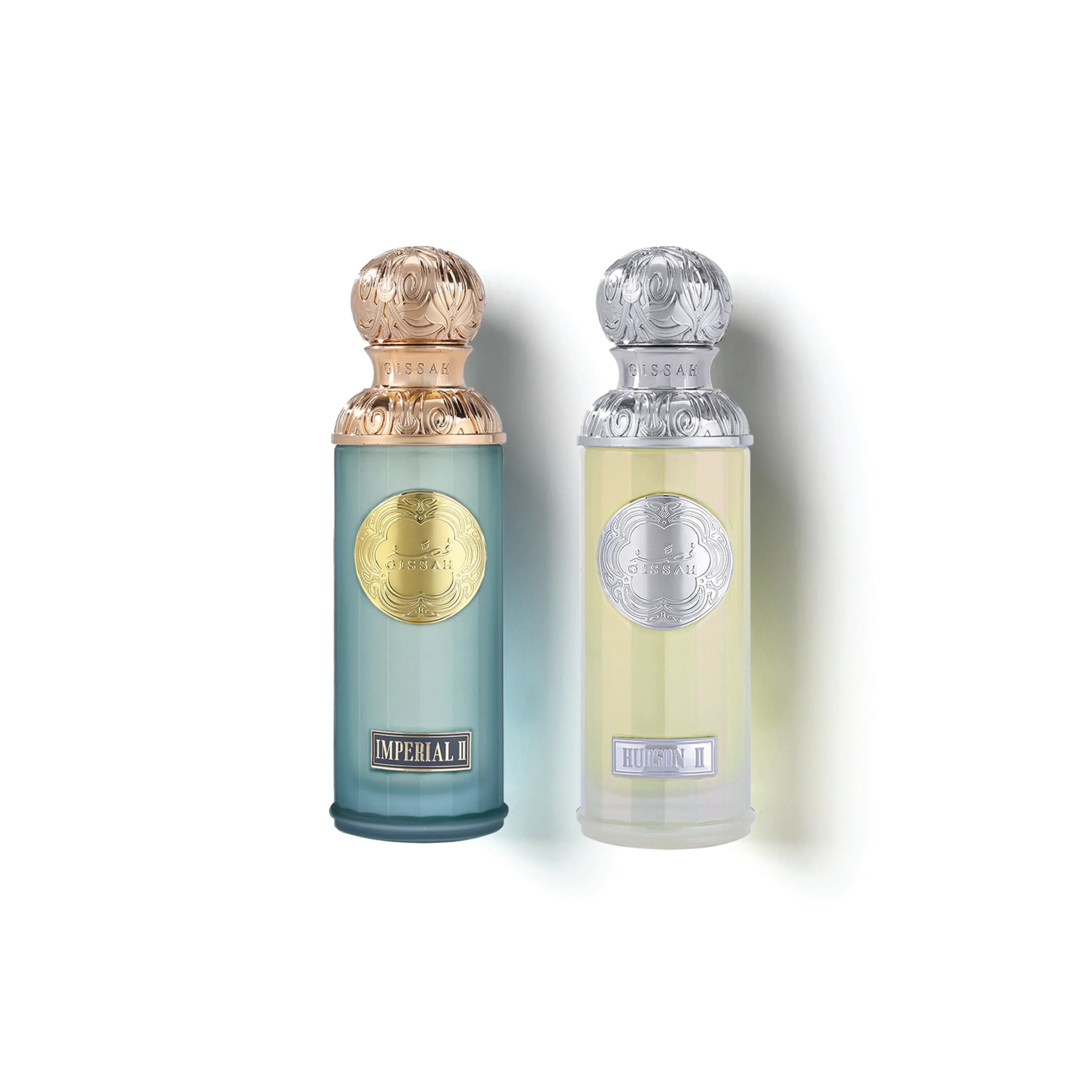 Elegant perfume bottles with ornate metallic caps and labels on a white background
