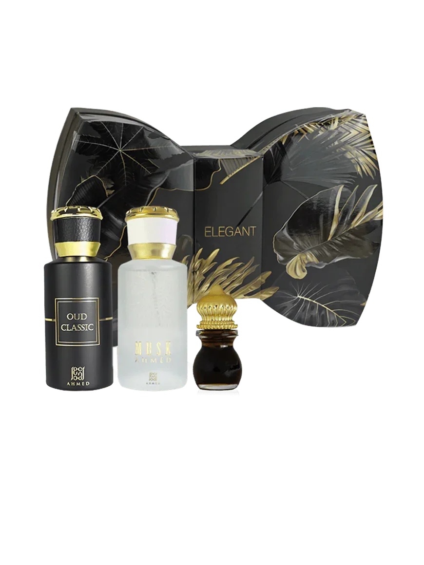 Luxury Middle Eastern perfume gift set with three elegant fragrance bottles and a decorative black and gold box.