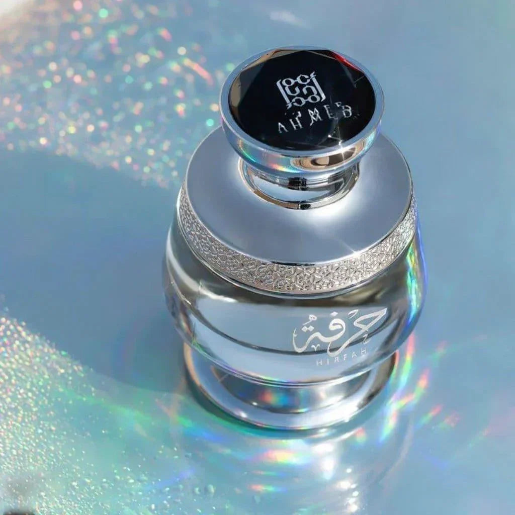 Luxury Middle Eastern perfume bottle with intricate silver design and holographic background
