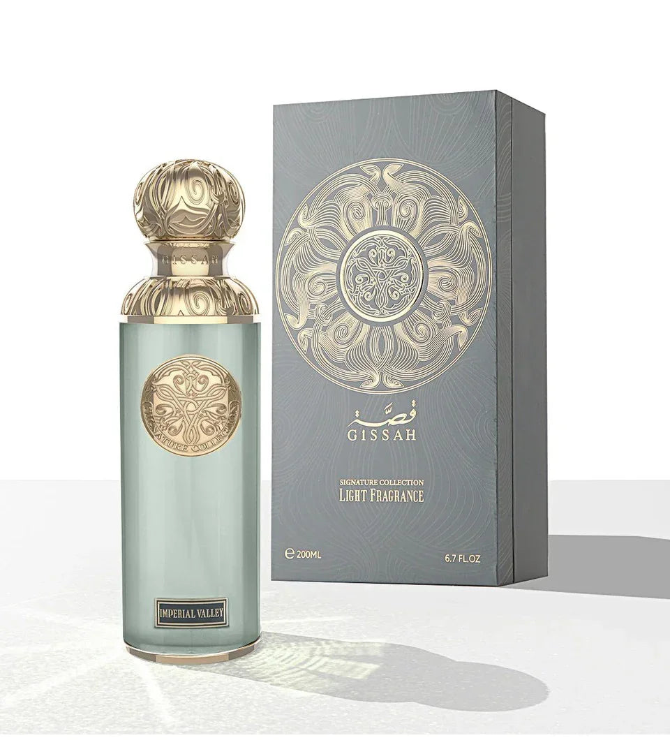 Elegant Gissah Imperial Valley perfume bottle with gold accents beside matching gift box