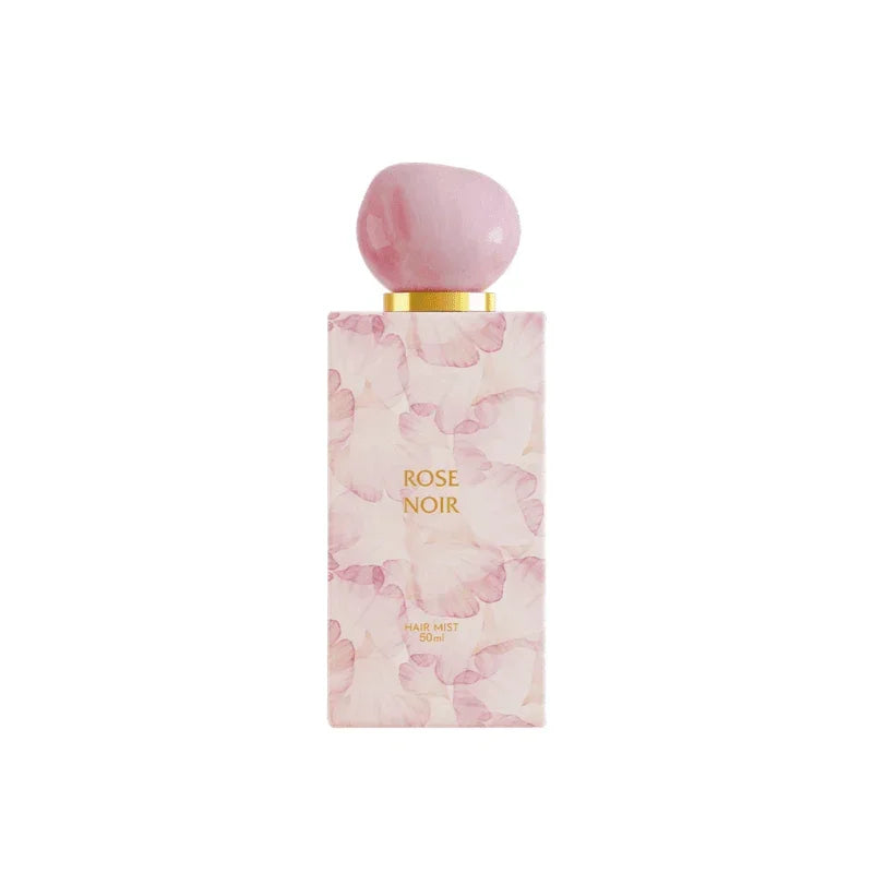 Rose Noir hair mist 50ml in a pink floral bottle with gold accents