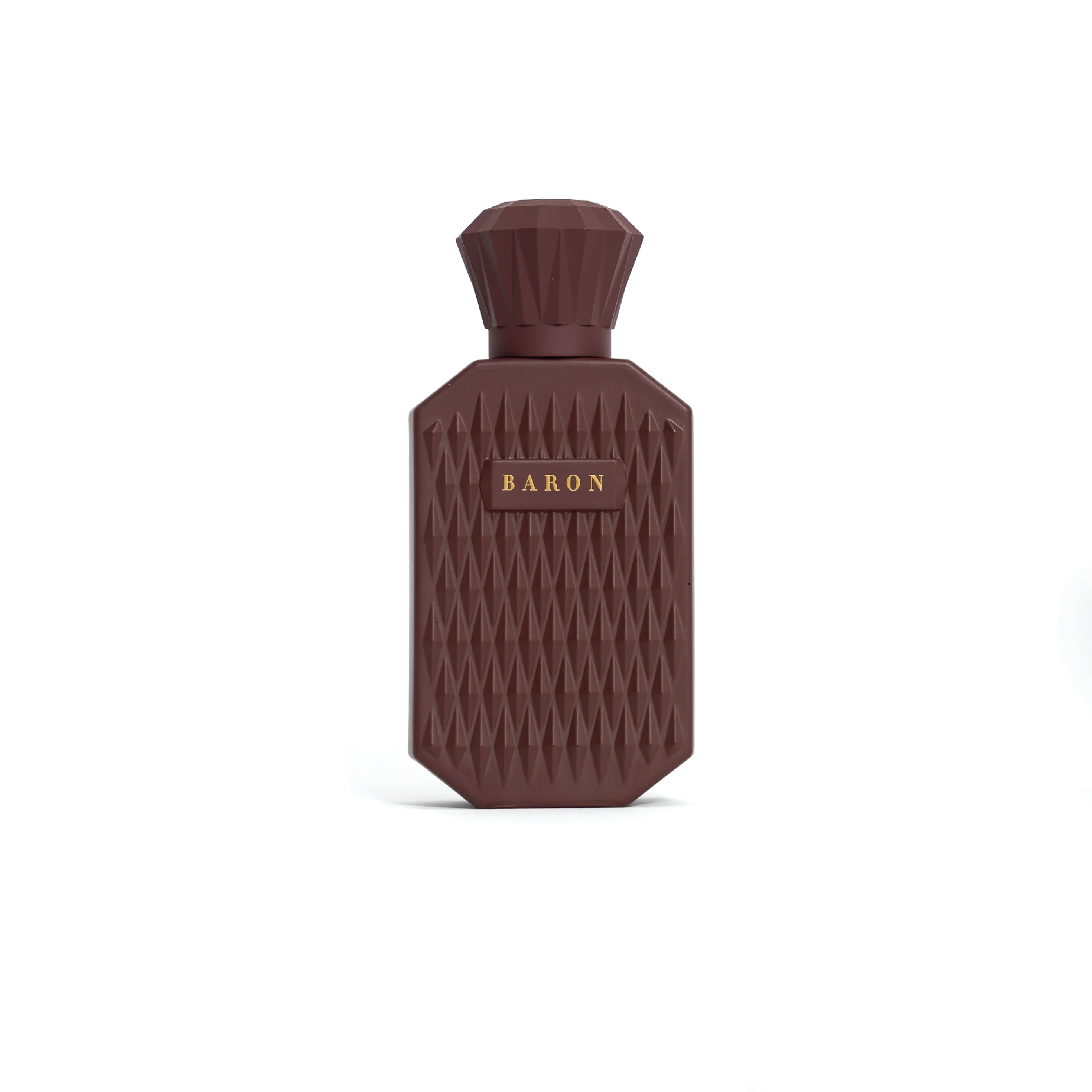 Elegant brown perfume bottle with geometric pattern and gold 'Baron' label, on white background.