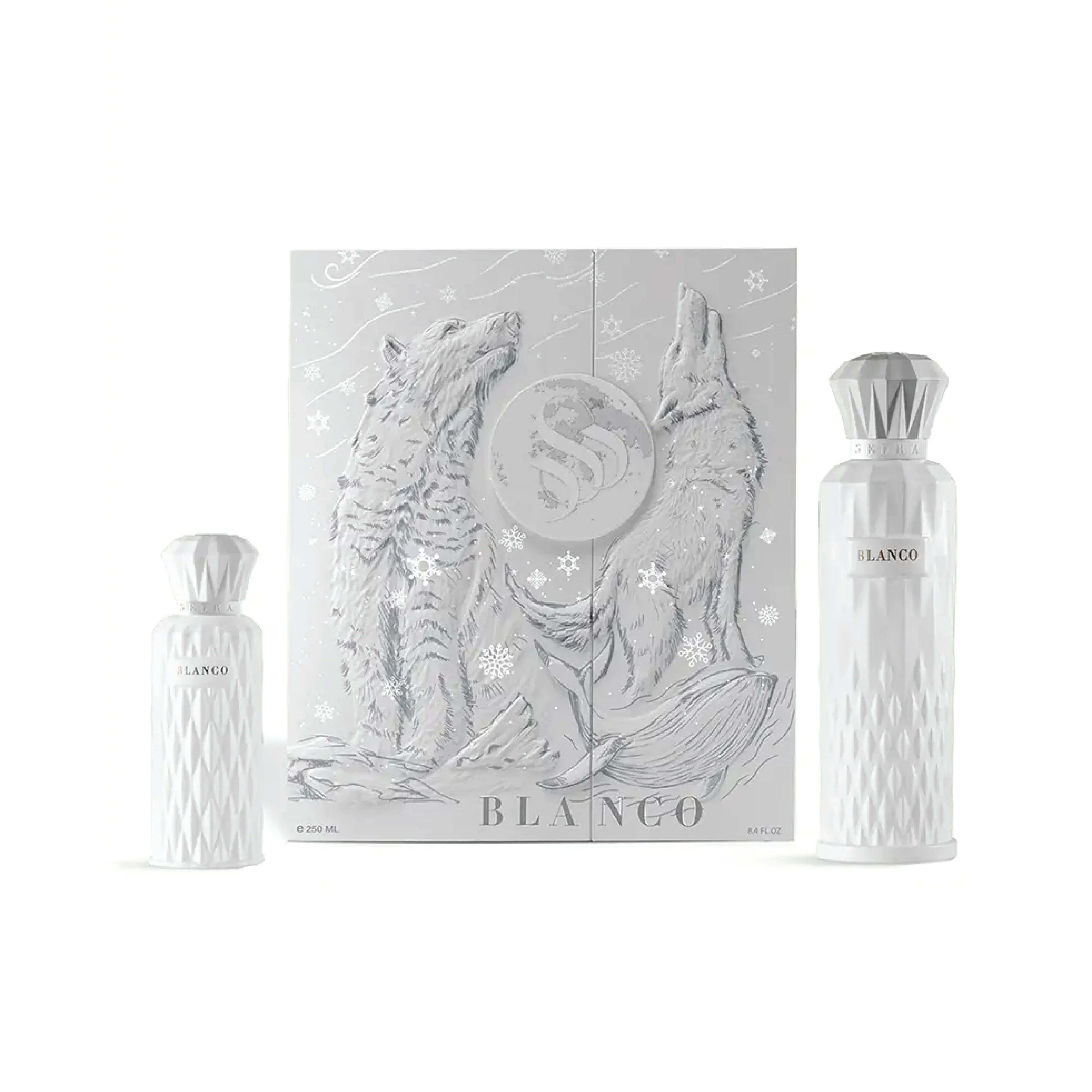 Luxury Blanco perfume bottles with embossed gift box featuring howling wolves and snowflakes.