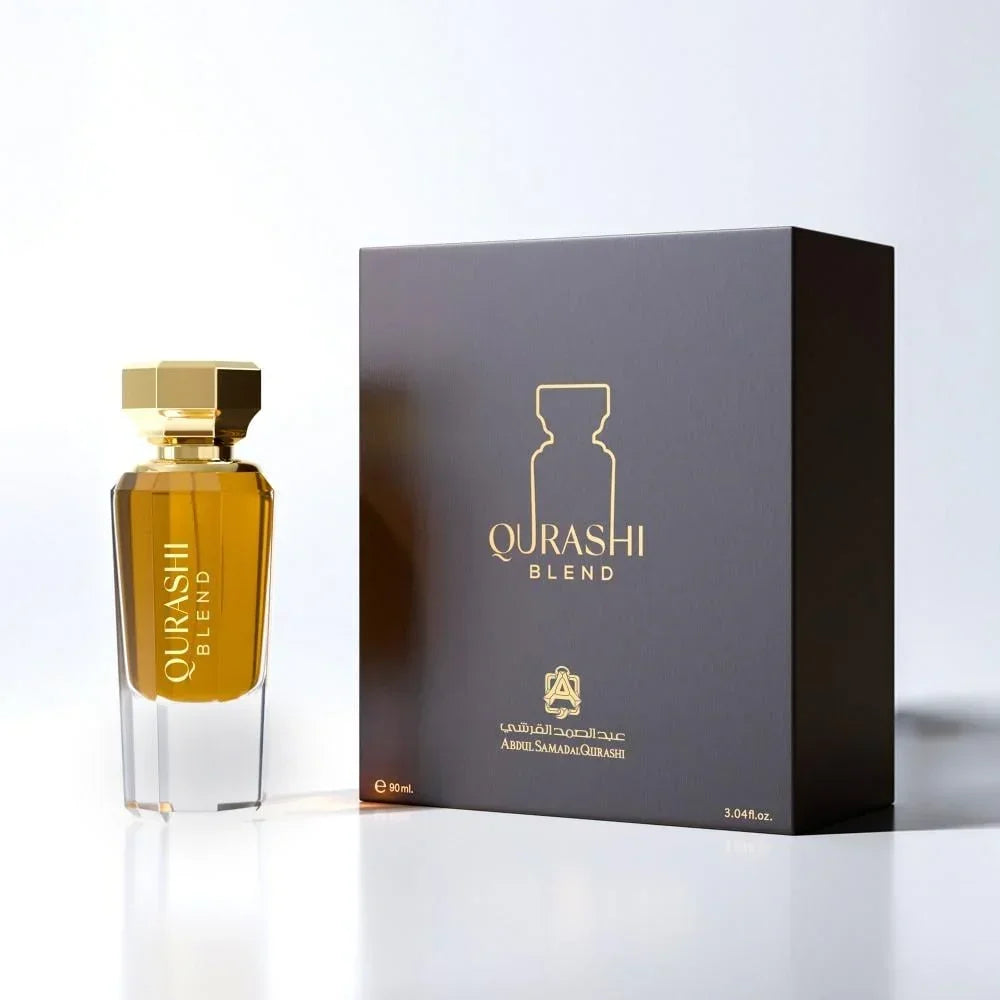 Qurashi Blend luxury perfume bottle and box with gold accents on a white background