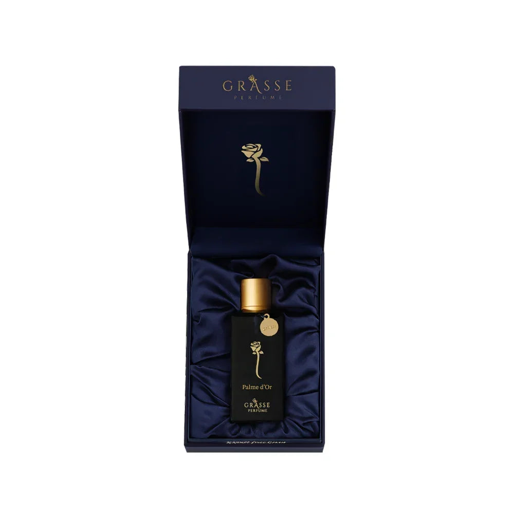 Luxury Grasse perfume bottle in a blue gift box with gold accents, Middle Eastern fragrance