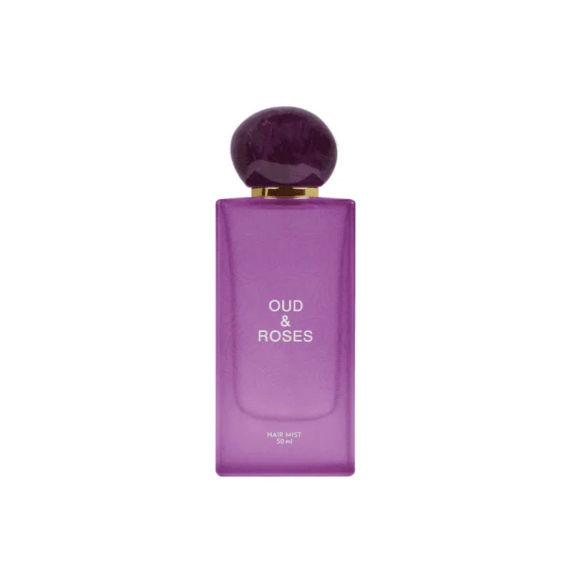 Purple bottle labeled Oud & Roses hair mist, 50ml, luxury Middle Eastern fragrance.