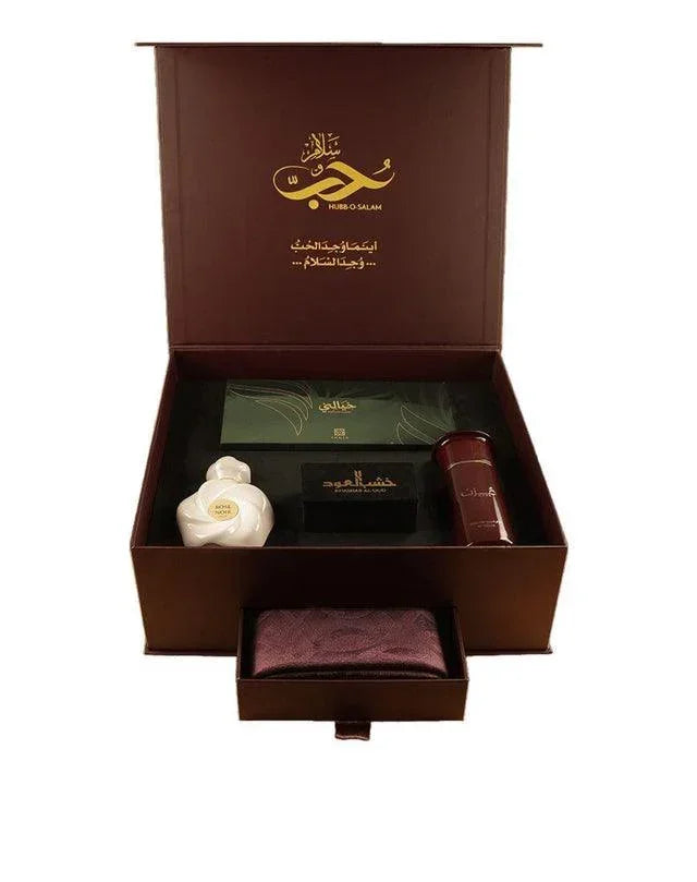 Luxury Middle Eastern perfume gift set with perfume bottle, box, and maroon pouch in open case