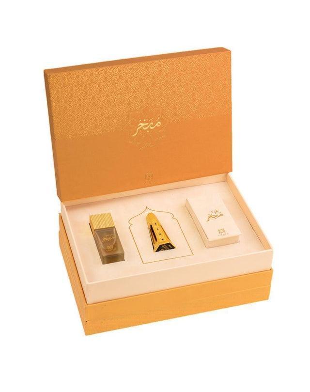 Luxurious Middle Eastern perfume gift set with gold decorative box and fragrance bottle