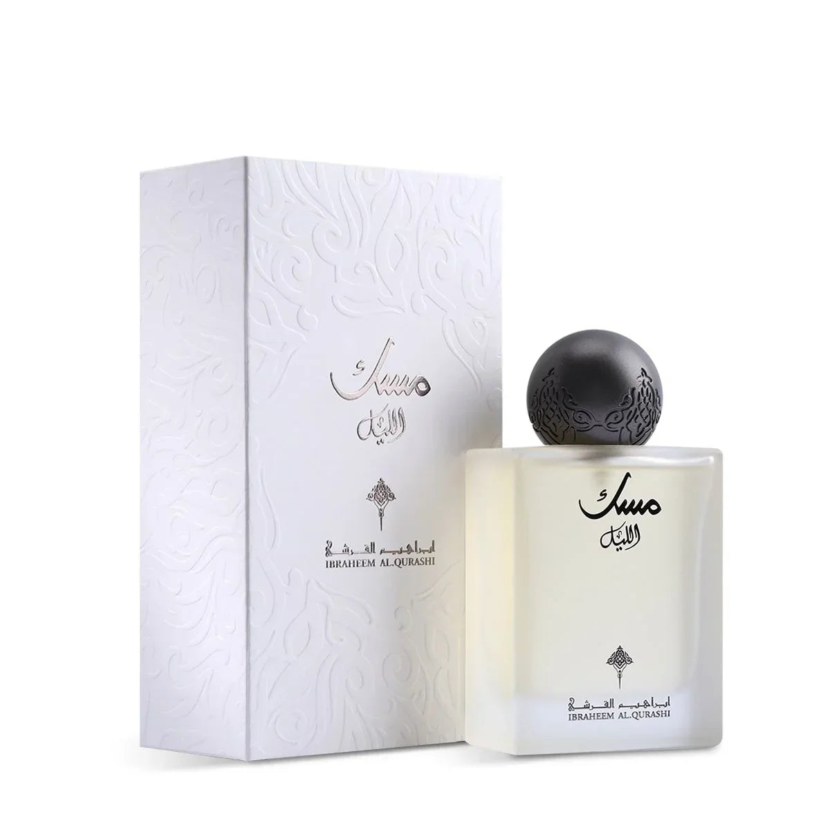 Elegant white perfume bottle and box with Arabic script, featuring luxury Middle Eastern fragrance