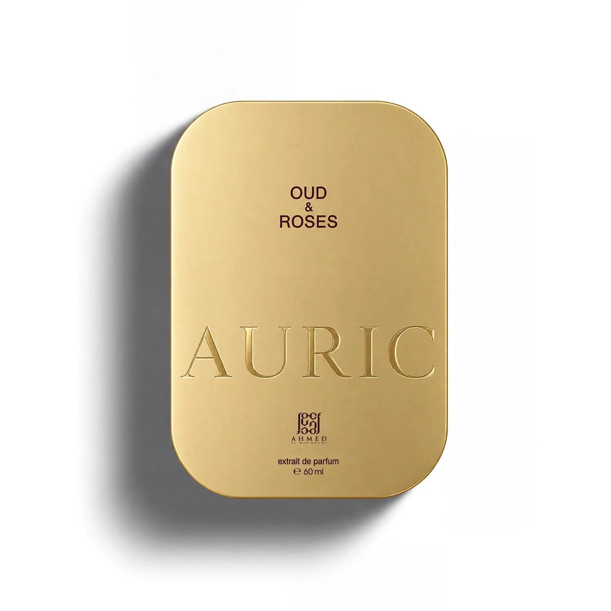 Gold rectangular perfume bottle for Oud & Roses Auric 60ml extrait de parfum with embossed branding on a white background.