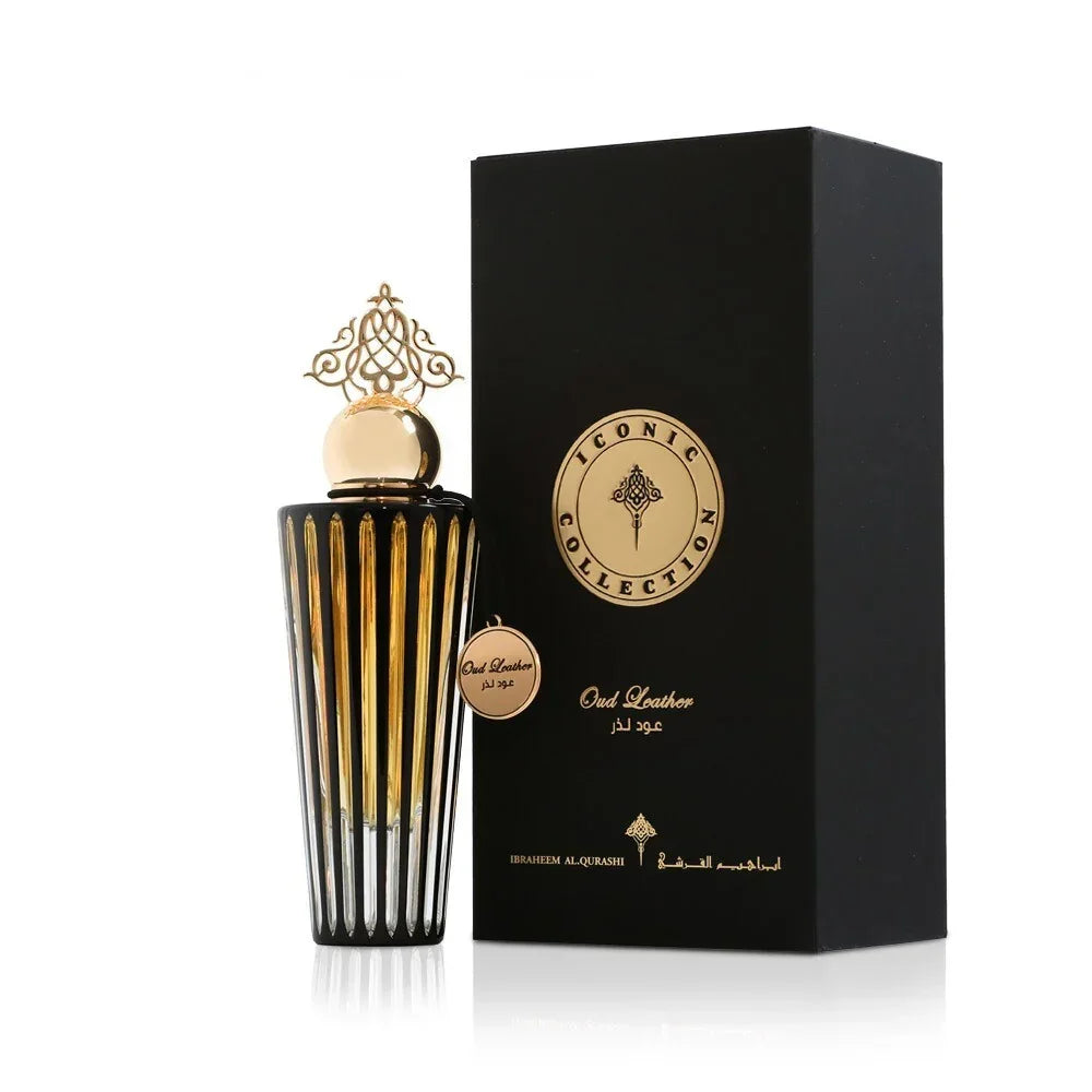 Elegant Oud Leather perfume bottle with gold accents beside luxury black gift box